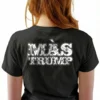 Woman wearing black Más Trump Spanish T-Shirt - Latino MAGA 2028 unisex patriotic graphic tee on female model