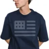 Man wearing navy US Flag Modern Freedom Patriot T-Shirt - Unisex patriotic American graphic tee - front grey logo design