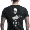 Man wearing black Trump National Hero 2024 T-Shirt - Unisex patriotic hero graphic tee for Trump supporters - design on back