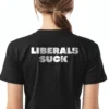 Woman wearing black Liberals Suck T-Shirt - Unisex bold conservative patriotic graphic tee on female model