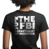 Woman wearing black Defund the FBI & Department of Injustice T-Shirt - Unisex pro-Trump patriotic graphic tee on female model