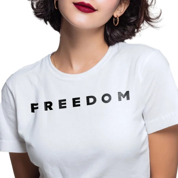 Woman wearing white Charlie Kirk Freedom T-shirt – Unisex memorial patriot conservative graphic tee