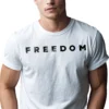 Man wearing white Charlie Kirk Freedom T-shirt – Unisex memorial patriot conservative graphic tee
